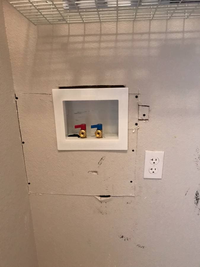 picture of a hot and cold shower valve installation